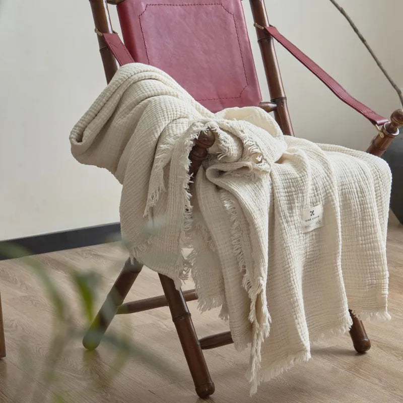 salon avec plaid coton blanc