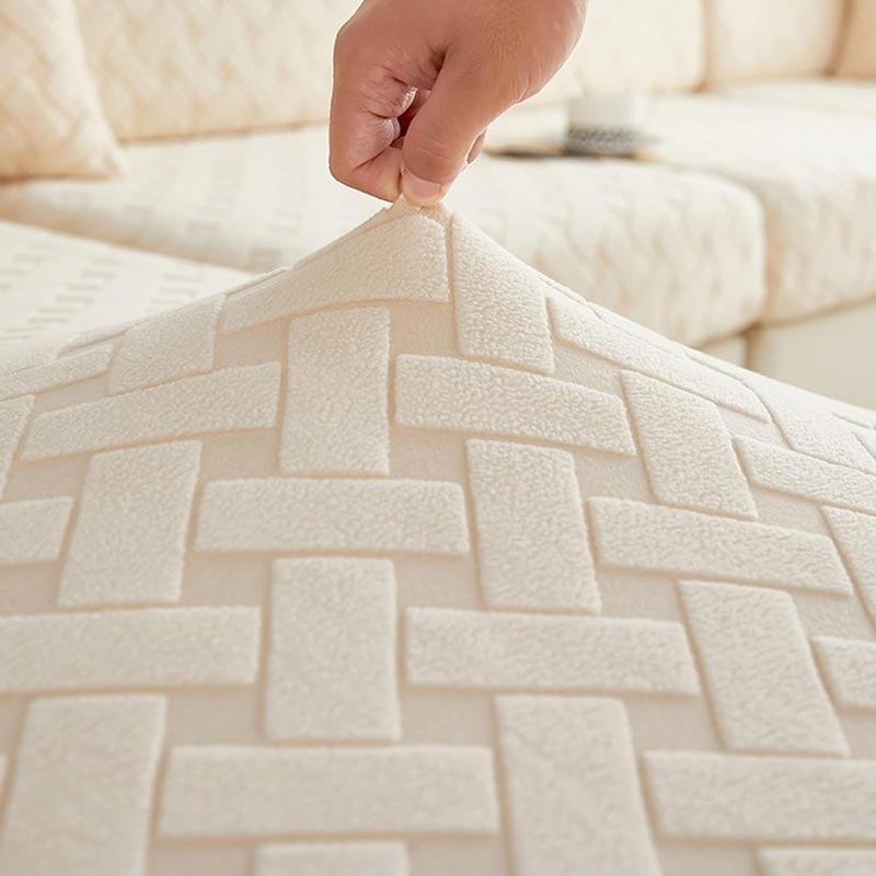 Housse beige pour canapé