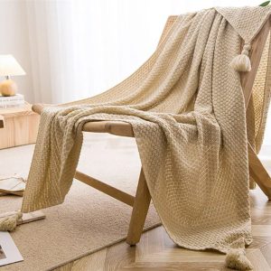 plaid macramé beige à pompons