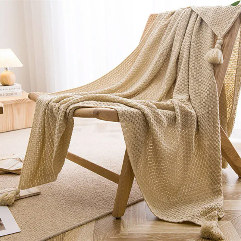 plaid macramé beige à pompons